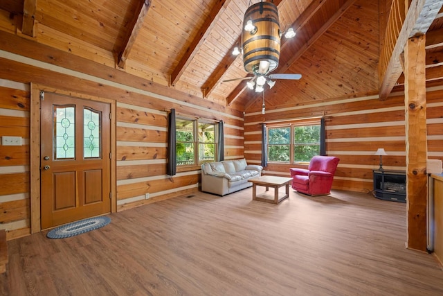 3000 Preston Bagwell Rd, Clarksville, TN 37043 - living room featuring wooden ceiling, wood finished floors, a ceiling fan, and wooden walls