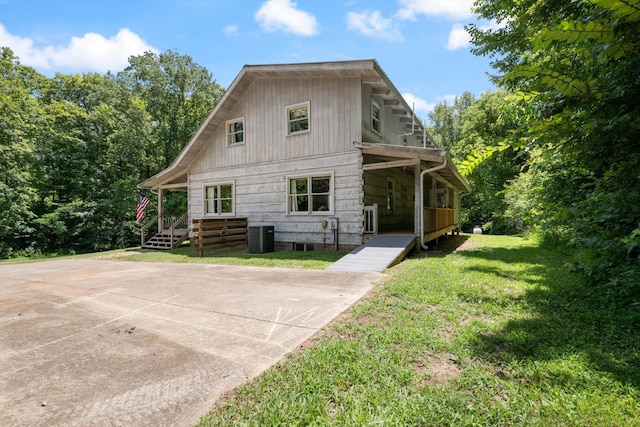 3000 Preston Bagwell Rd, Clarksville, TN 37043 - rear view of house with covered porch and a lawn