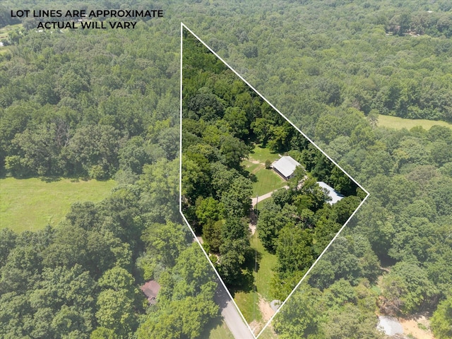 3000 Preston Bagwell Rd, Clarksville, TN 37043 - aerial view of property and surrounding area with a heavily wooded area and property parcel outlined