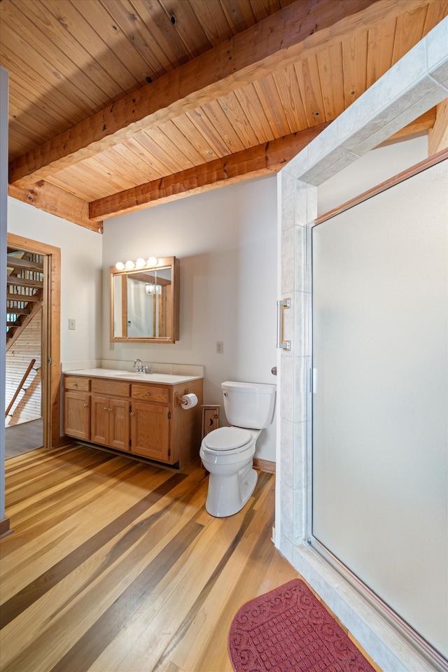 3000 Preston Bagwell Rd, Clarksville, TN 37043 - full bathroom featuring vanity, a wood ceiling with exposed beams, a stall shower, and wood finished floors