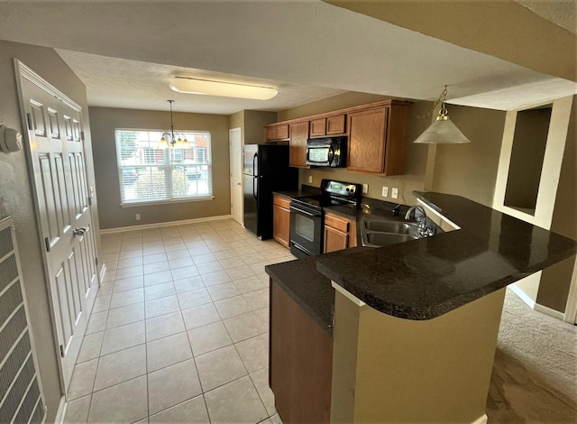 3164 Prater Ct, Murfreesboro, TN 37128 - kitchen featuring black appliances, brown cabinets, dark countertops, a chandelier, and decorative light fixtures