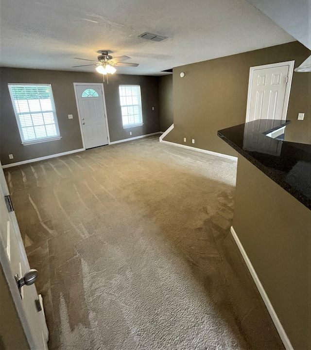 3164 Prater Ct, Murfreesboro, TN 37128 - unfurnished living room with carpet, ceiling fan, and healthy amount of natural light
