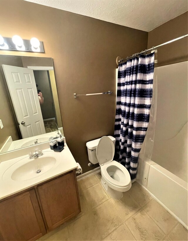 3164 Prater Ct, Murfreesboro, TN 37128 - bathroom with vanity, shower / bath combo, a textured ceiling, and tile patterned flooring