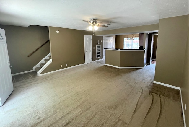 3164 Prater Ct, Murfreesboro, TN 37128 - unfurnished room featuring light carpet, ceiling fan, and stairs