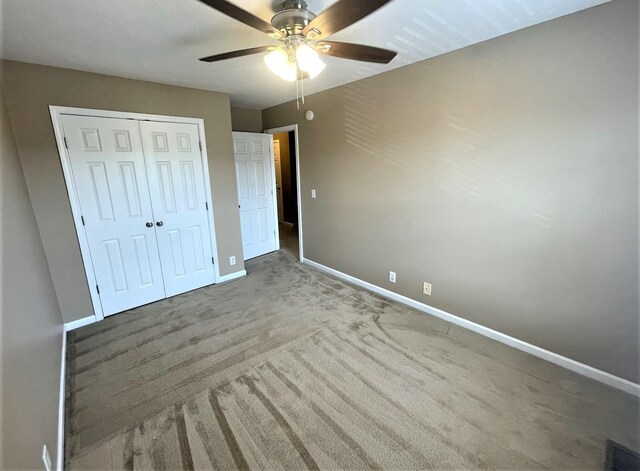 3164 Prater Ct, Murfreesboro, TN 37128 - unfurnished bedroom with a closet, carpet flooring, and a ceiling fan