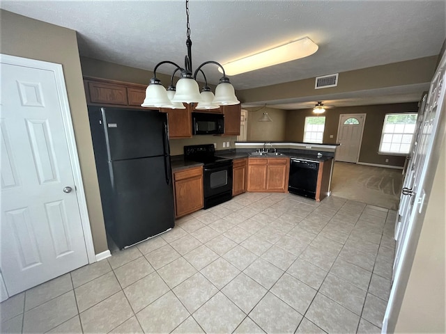 3164 Prater Ct, Murfreesboro, TN 37128 - kitchen featuring black appliances, a peninsula, light tile patterned flooring, and a ceiling fan