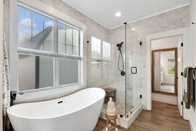 332 Country Club Rd, Winchester, TN 37398 - full bath featuring a soaking tub, wood finished floors, and a shower stall