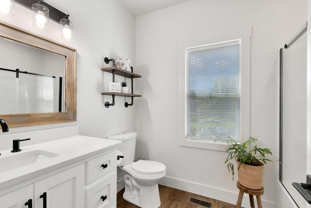 332 Country Club Rd, Winchester, TN 37398 - bathroom featuring wood finished floors, vanity, and a shower