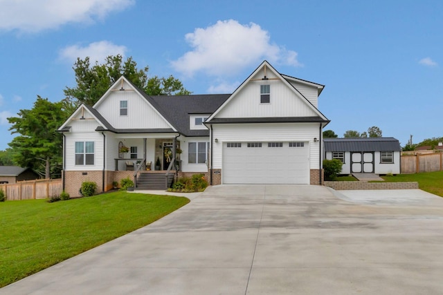 332 Country Club Rd, Winchester, TN 37398 - modern farmhouse featuring driveway, a porch, brick siding, board and batten siding, and a storage unit