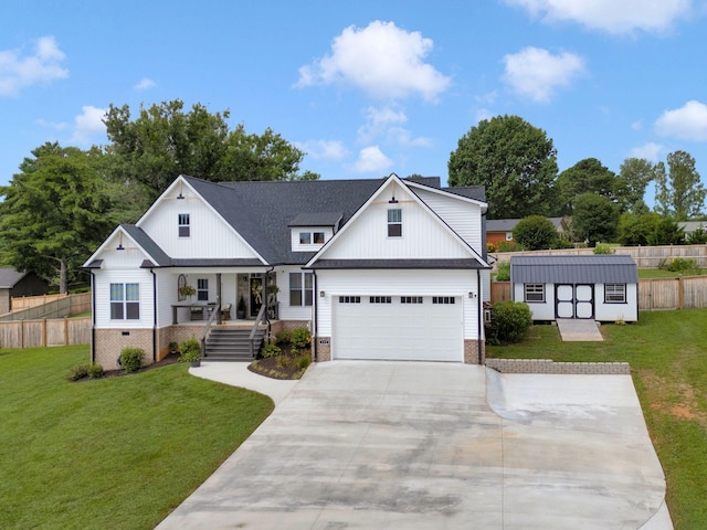 332 Country Club Rd, Winchester, TN 37398 - modern farmhouse with covered porch, driveway, an outbuilding, and brick siding