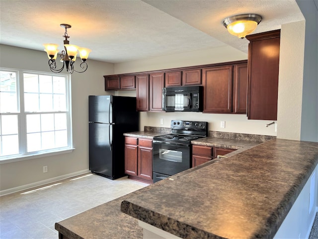 3754 Chippewa Pl, Murfreesboro, TN 37128 - kitchen featuring black appliances, dark countertops, a chandelier, a peninsula, and pendant lighting