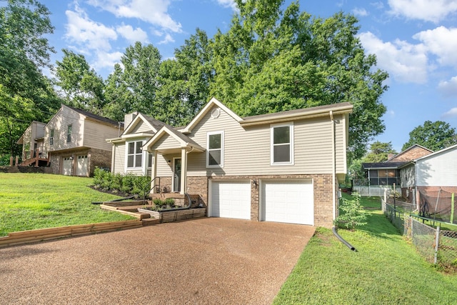 1204 Lambeth Way, Antioch, TN 37013 - view of front of house with driveway, a garage, and brick siding