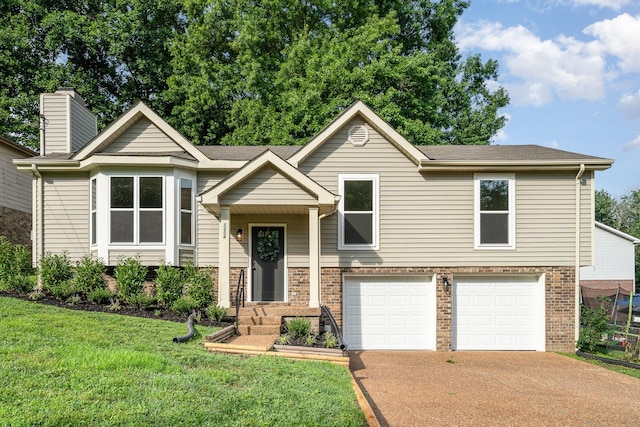 1204 Lambeth Way, Antioch, TN 37013 - split foyer home with brick siding, a garage, a front lawn, concrete driveway, and a chimney