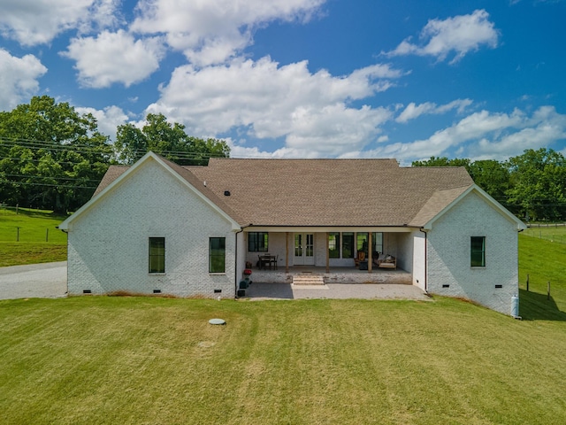 5247 Flat Creek Rd, Spring Hill, TN 37174 - back of house featuring crawl space, brick siding, a patio, a lawn, and french doors
