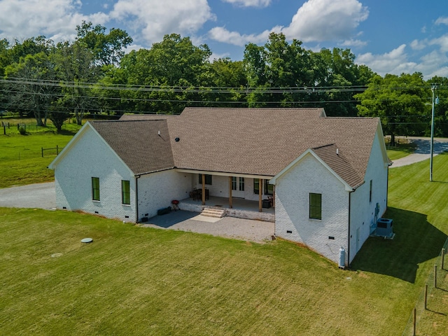 5247 Flat Creek Rd, Spring Hill, TN 37174 - back of house with crawl space, a patio, brick siding, and roof with shingles