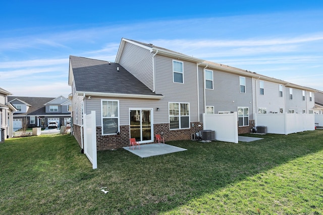 622 Birdie Dr, Spring Hill, TN 37174 - back of property with a patio area, brick siding, and a residential view