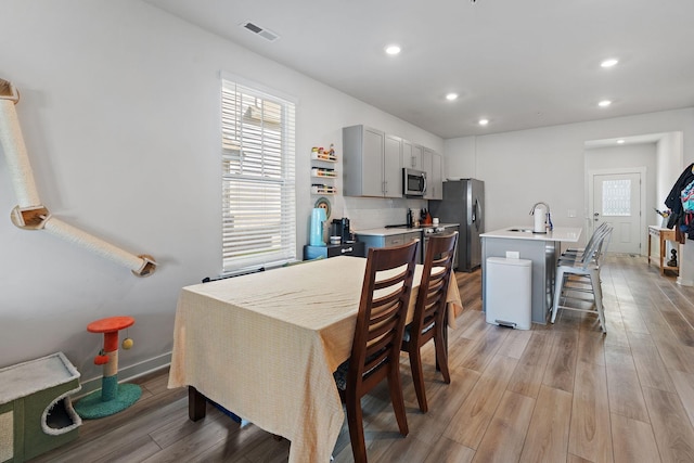 622 Birdie Dr, Spring Hill, TN 37174 - dining room featuring light wood-style flooring and recessed lighting