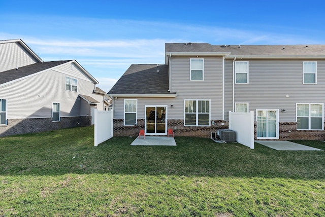 622 Birdie Dr, Spring Hill, TN 37174 - back of property with a patio area and brick siding