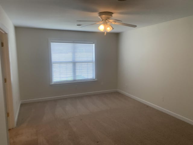 401 Ravencliff Ct, Smyrna, TN 37167 - spare room with light colored carpet and a ceiling fan