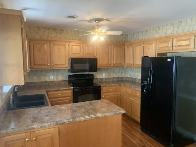 401 Ravencliff Ct, Smyrna, TN 37167 - kitchen featuring black appliances, light brown cabinets, a ceiling fan, dark wood-style flooring, and a peninsula
