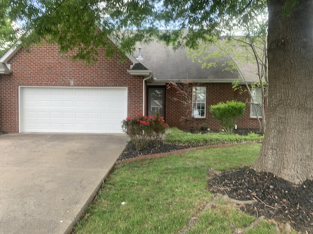 401 Ravencliff Ct, Smyrna, TN 37167 - view of front facade featuring brick siding, an attached garage, and concrete driveway