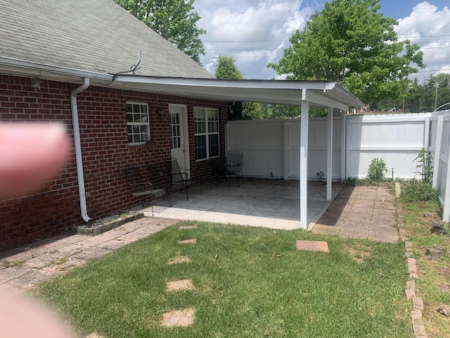 401 Ravencliff Ct, Smyrna, TN 37167 - view of patio / terrace featuring a carport
