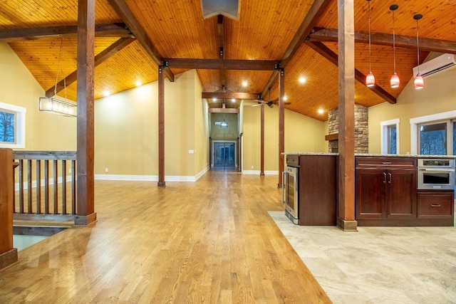 1224 Hangar Dr, Springfield, TN 37172 - kitchen with stainless steel oven, wood ceiling, light wood-type flooring, light stone counters, and pendant lighting