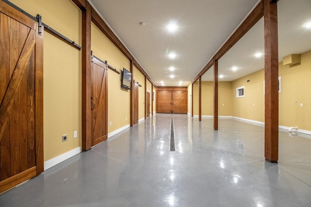 1224 Hangar Dr, Springfield, TN 37172 - basement with a barn door and baseboards