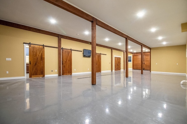 1224 Hangar Dr, Springfield, TN 37172 - basement with a barn door and baseboards