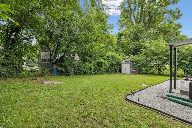 819 Woodside St, Columbia, TN 38401 - view of yard featuring a storage unit and a patio