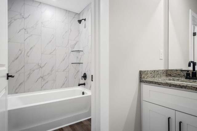 4013 Norman Dr, Spring Hill, TN 37174 - bathroom with vanity, shower / bathtub combination, and wood finished floors