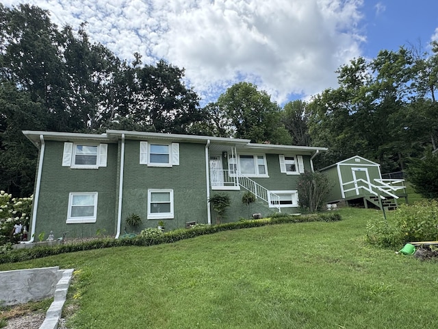 214 Shevel Dr, Goodlettsville, TN 37072 - view of front facade with a shed and a front yard