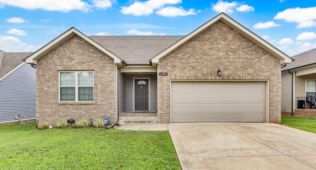 626 Snowshoe Ln, Clarksville, TN 37040 - single story home with brick siding, a garage, concrete driveway, a front lawn, and a shingled roof