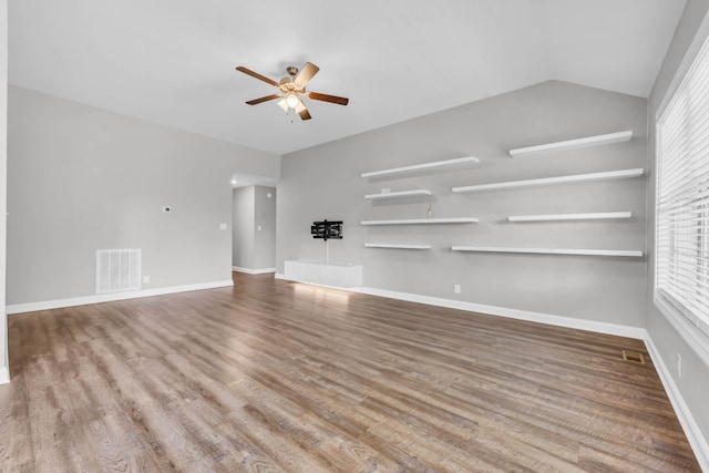 626 Snowshoe Ln, Clarksville, TN 37040 - unfurnished living room with ceiling fan, wood finished floors, and healthy amount of natural light