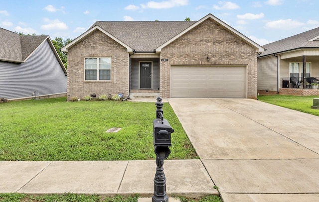 626 Snowshoe Ln, Clarksville, TN 37040 - single story home featuring brick siding, a front yard, an attached garage, and concrete driveway