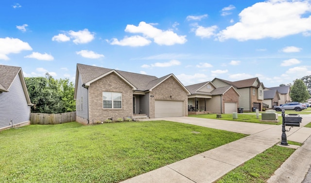 626 Snowshoe Ln, Clarksville, TN 37040 - view of front facade with brick siding, driveway, a garage, and a residential view
