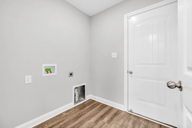 626 Snowshoe Ln, Clarksville, TN 37040 - washroom with hookup for a washing machine, wood finished floors, and hookup for an electric dryer