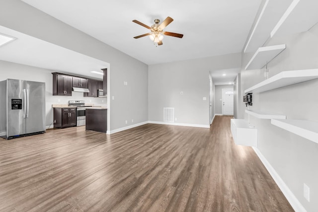 626 Snowshoe Ln, Clarksville, TN 37040 - unfurnished living room featuring ceiling fan and wood finished floors