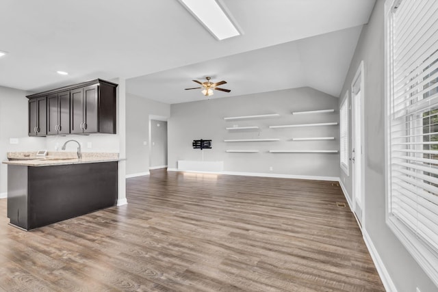 626 Snowshoe Ln, Clarksville, TN 37040 - unfurnished living room featuring ceiling fan, wood finished floors, and lofted ceiling