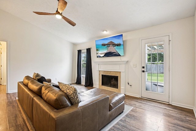 3315 Monoco Dr, Spring Hill, TN 37174 - living room with wood finished floors, a fireplace, a ceiling fan, and lofted ceiling