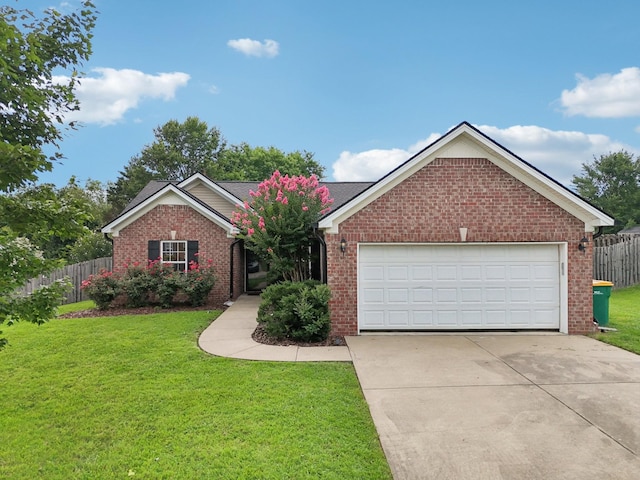 3315 Monoco Dr, Spring Hill, TN 37174 - ranch-style house featuring driveway, brick siding, and a garage