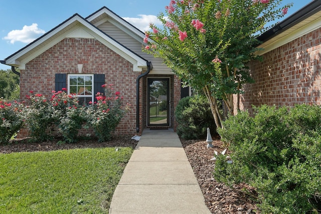 3315 Monoco Dr, Spring Hill, TN 37174 - entrance to property featuring brick siding and a lawn
