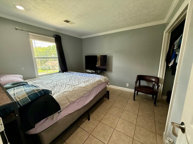231 Overlook Pl, Columbia, TN 38401 - bedroom with a textured ceiling, light tile patterned floors, and crown molding