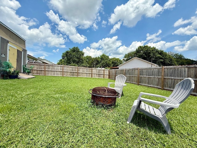 231 Overlook Pl, Columbia, TN 38401 - fenced backyard with a fire pit