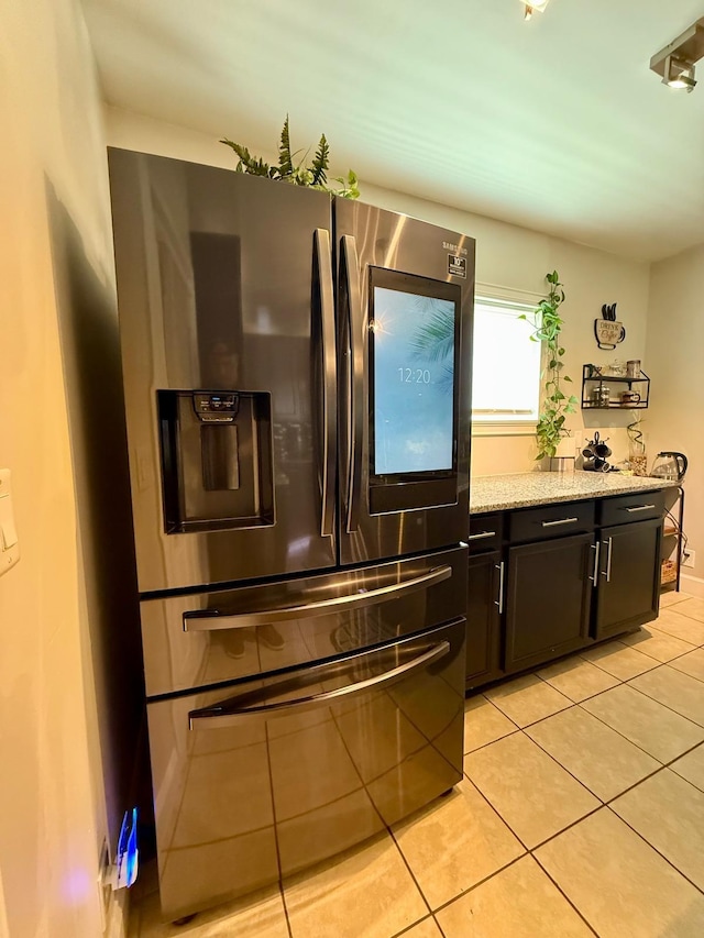 231 Overlook Pl, Columbia, TN 38401 - kitchen featuring stainless steel refrigerator with ice dispenser, light tile patterned flooring, and light stone counters