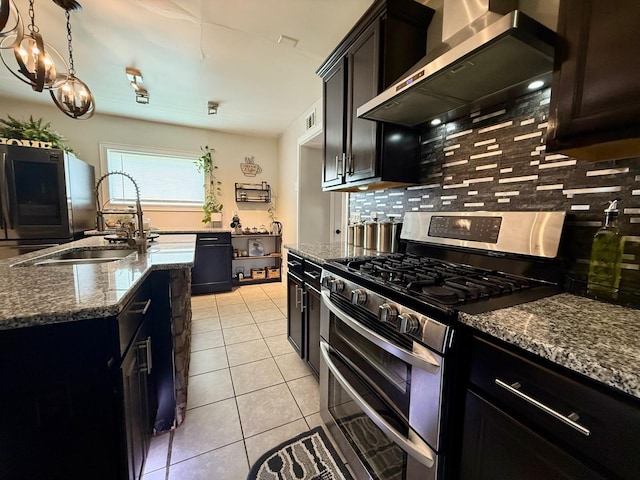 231 Overlook Pl, Columbia, TN 38401 - kitchen with range with two ovens, wall chimney range hood, fridge, and tasteful backsplash