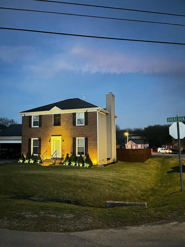 231 Overlook Pl, Columbia, TN 38401 - colonial house featuring a chimney and brick siding