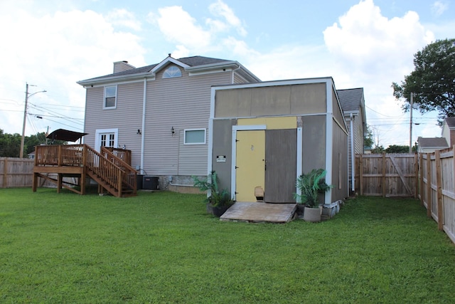 231 Overlook Pl, Columbia, TN 38401 - back of house with a fenced backyard, a deck, a shed, and a chimney