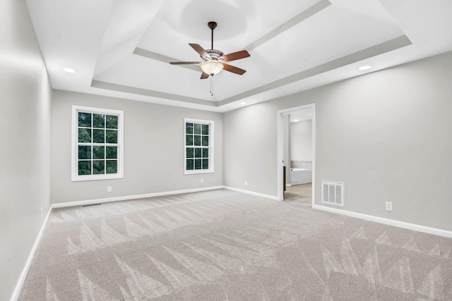 3190 Marthas Chapel Rd, Cunningham, TN 37052 - spare room featuring a raised ceiling, carpet, a ceiling fan, and recessed lighting