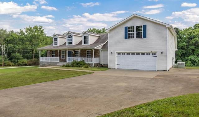 3190 Marthas Chapel Rd, Cunningham, TN 37052 - view of front facade featuring covered porch, an attached garage, driveway, and a front yard